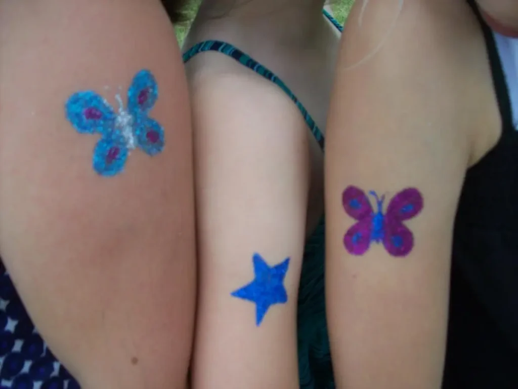 Airbrush tattoo op arm - tijdelijke tattoo